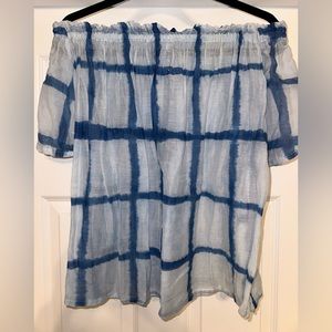 Elastic, off the shoulder, flowy top.